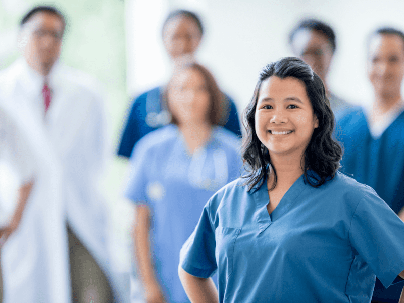 Group of doctors in blue scrubs